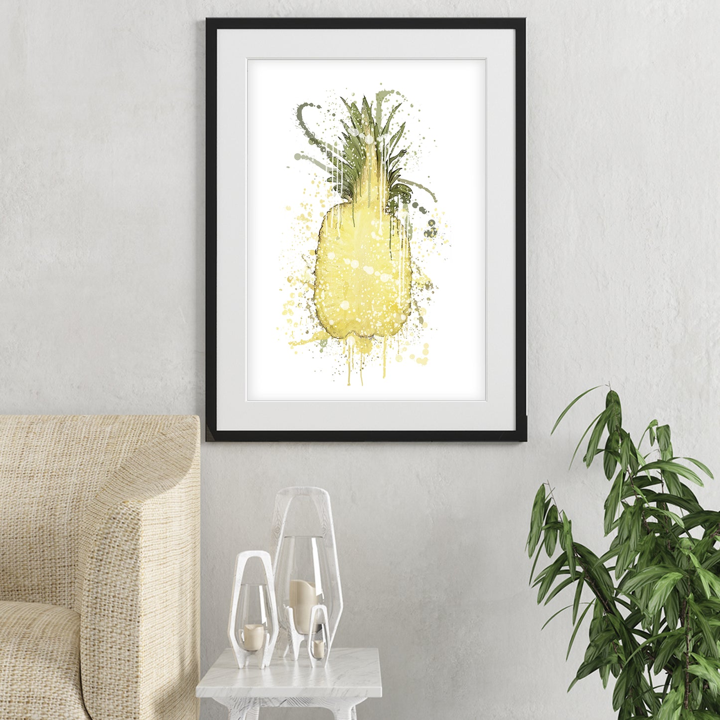 pineapple wall art shown in a living room