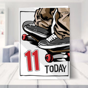 skateboarding 11th birthday card shown in a living room
