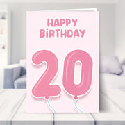 20th birthday cards for her shown in a living room