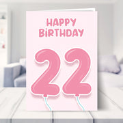 22nd birthday cards for her shown in a living room