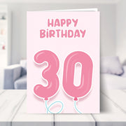 30th birthday cards for her shown in a living room