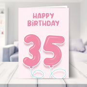 35th birthday cards for her shown in a living room