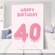 40th birthday cards for her shown in a living room