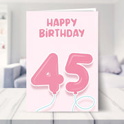 45th birthday cards for her shown in a living room