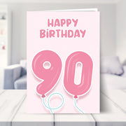 90th birthday cards for her shown in a living room