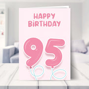 95th birthday cards for her shown in a living room