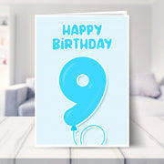 9th birthday card for boys shown in a living room