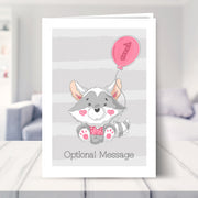 birthday card for 1 year old shown in a living room