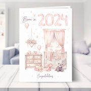 baby girl card shown in a living room