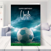 football birthday card shown in a living room
