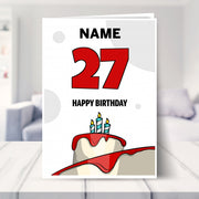 happy 27th birthday card shown in a living room