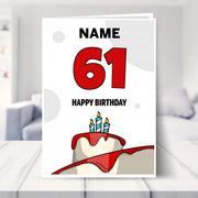happy 61st birthday card shown in a living room