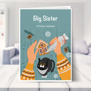 Big Sister christmas card shown in a living room