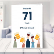 fun 71st birthday card shown in a living room