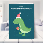 dinosaur christmas cards shown in a living room
