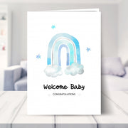 baby boy card shown in a living room