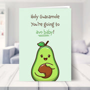 congratulations baby card shown in a living room