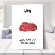 steak and bj card shown in a living room
