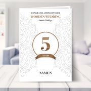 5th wedding anniversary card shown in a living room