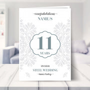 11th wedding anniversary card shown in a living room