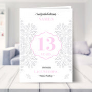 13th wedding anniversary card shown in a living room