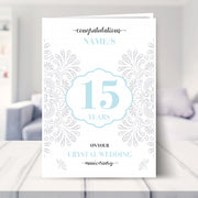 15th wedding anniversary card shown in a living room
