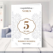 5th wedding anniversary card shown in a living room