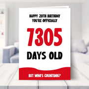 20th birthday card shown in a living room