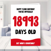 52nd birthday card shown in a living room