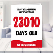 63rd birthday card shown in a living room