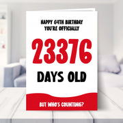 64th birthday card shown in a living room