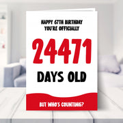 67th birthday card shown in a living room