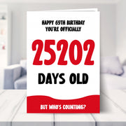 69th birthday card shown in a living room