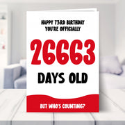 73rd birthday card shown in a living room