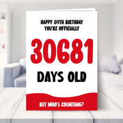 84th birthday card shown in a living room