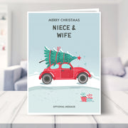 niece and wife christmas card shown in a living room