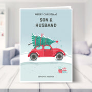 son and husband christmas card shown in a living room