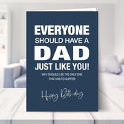 funny birthday card for dad shown in a living room