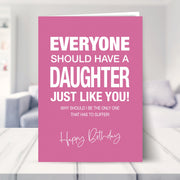 funny birthday card for daughter shown in a living room