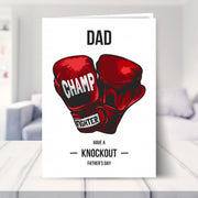 boxing father's day card shown in a living room