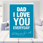 sarcastic fathers day card shown in a living room