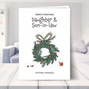 Daughter & Son-in-law christmas card shown in a living room