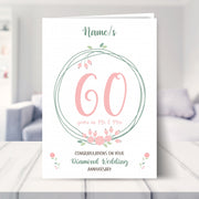 60th wedding anniversary card shown in a living room