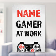 framed gaming prints shown in a living room
