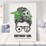 football birthday card shown in a living room