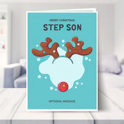 Step Son christmas card shown in a living room