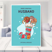 Husband christmas card shown in a living room