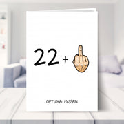 funny 23rd birthday card shown in a living room