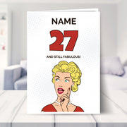 funny 27th birthday card shown in a living room