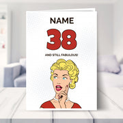 funny 38th birthday card shown in a living room